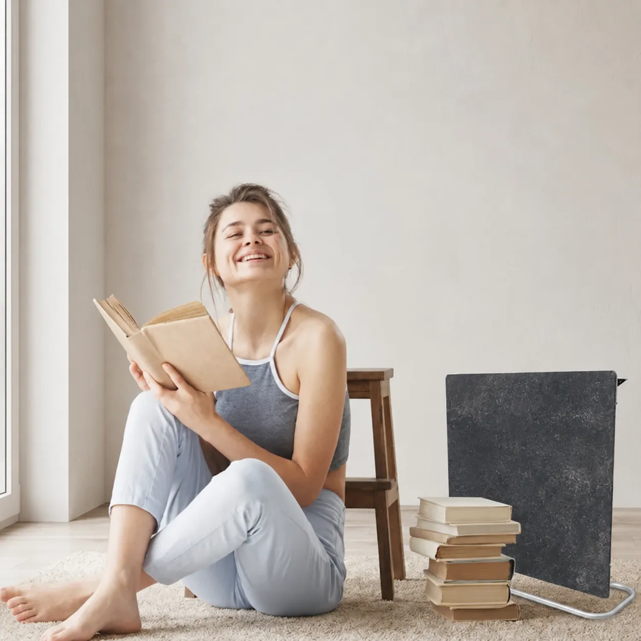 Radiateur électrique Inertia 3 en 1 installé au mur dans un intérieur moderne